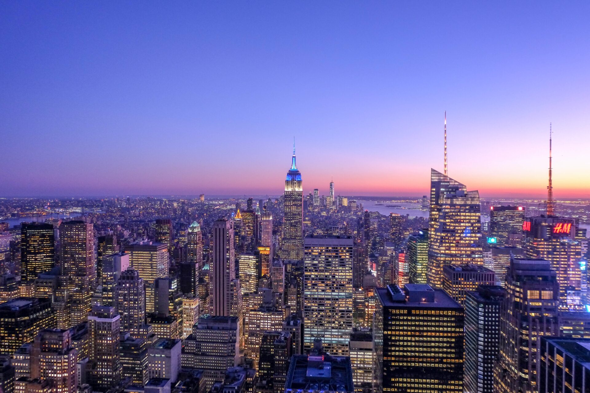 The new york city skyline at dusk.