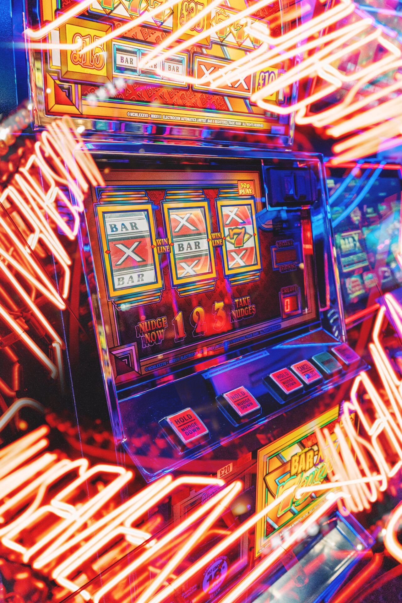 An image of a slot machine with neon lights.